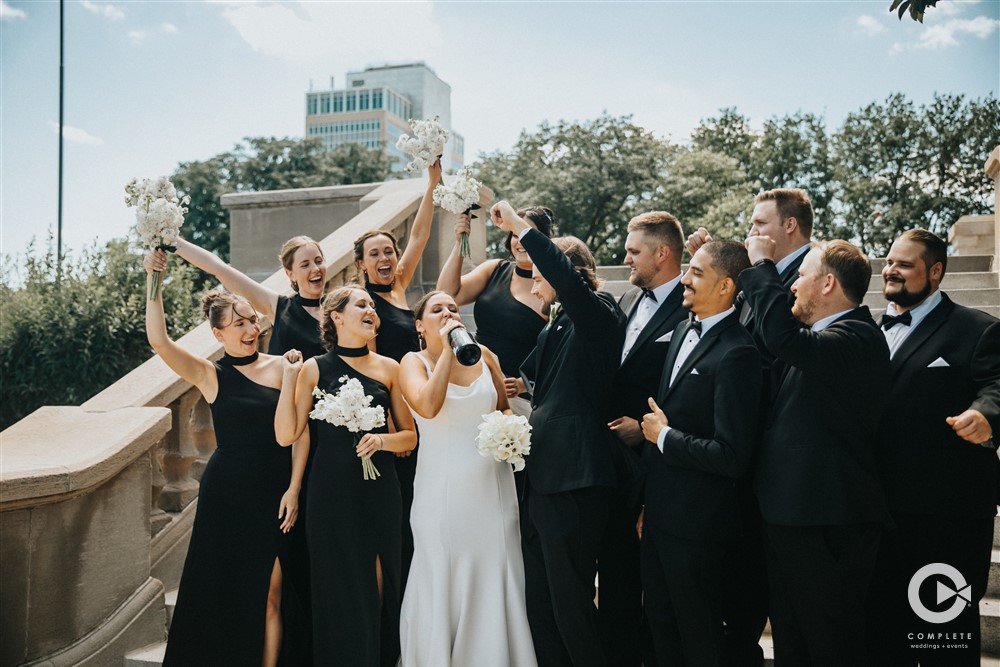 fun wedding party photos Vanessa with Complete Weddings + Events Omaha wedding photographer