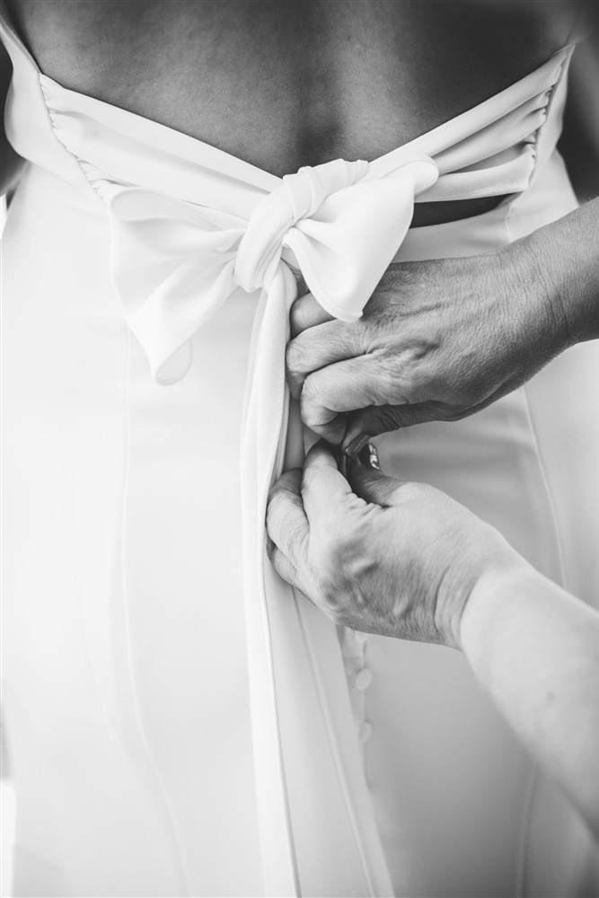 Bride getting ready at The Leo Ballroom in Omaha NE with photographer Katie Hammond