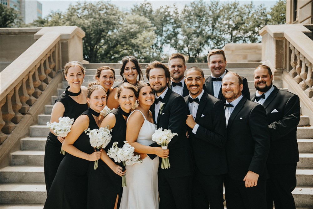 Bride and groom with the bridal party at The Leo Ballroom in Omaha NE with photographer Katie Hammond