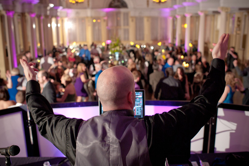 Don't Fall For These Orlando Wedding DJ Myths Orlando FL DJ pumping up crowd in big reception hall during wedding