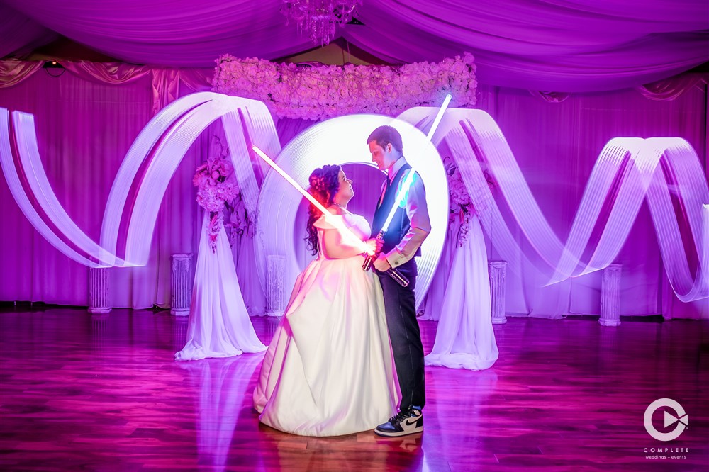 Couple Portrait with Light Sabers