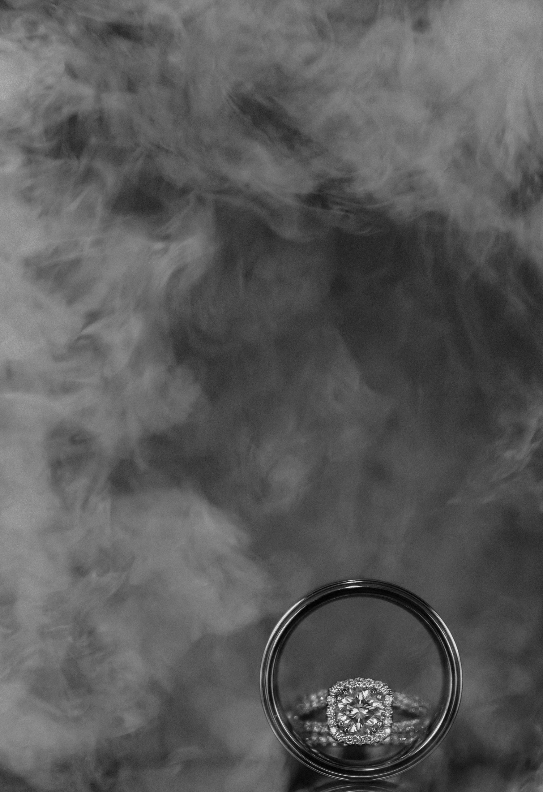 Wedding ring with smoke in background