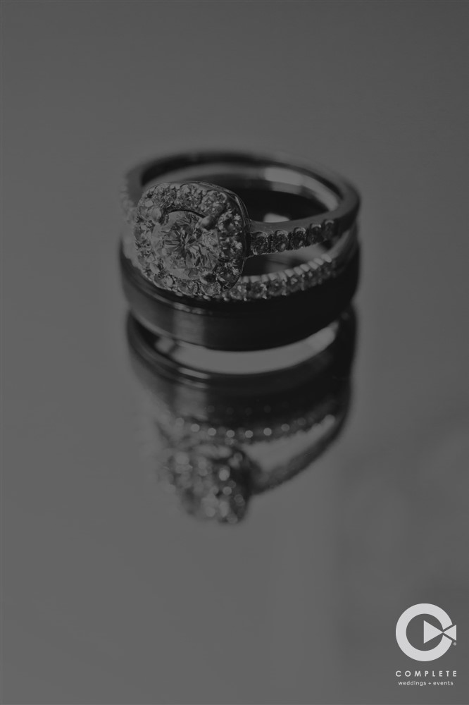 Black and white photo of wedding rings