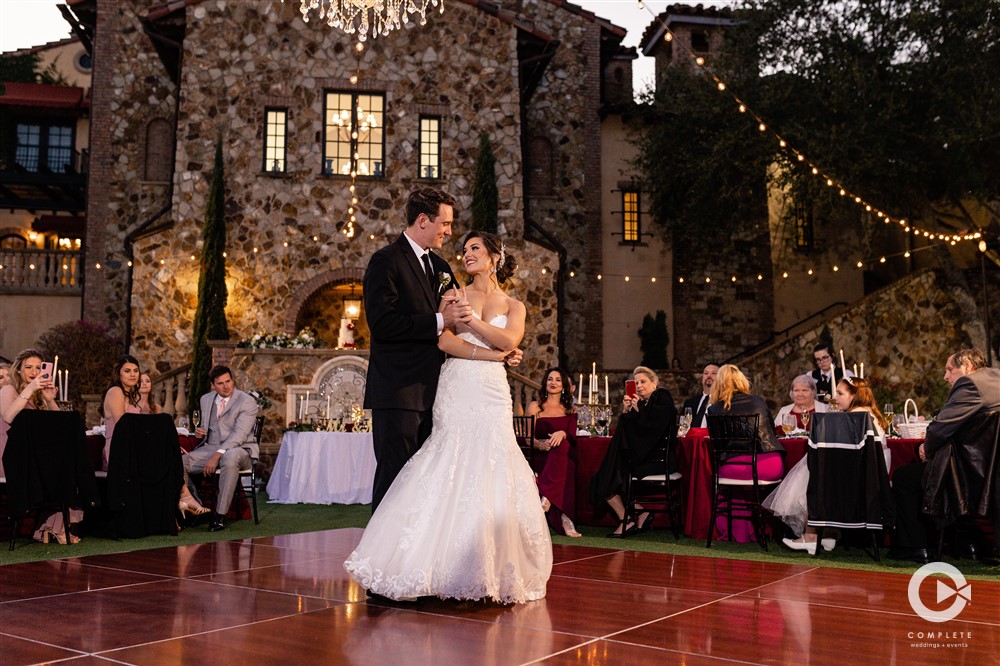 First dance wedding photo outside of Bella Collina February wedding in West Orlando