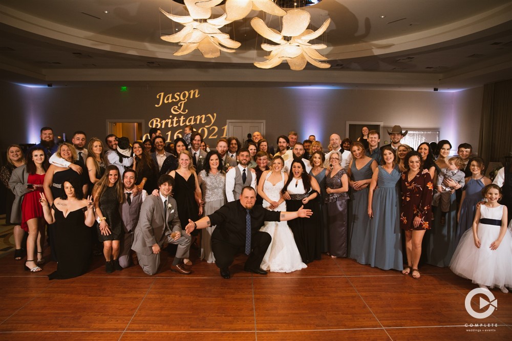 The Omni Resort Orlando indoor reception space group photo of the wedding party
