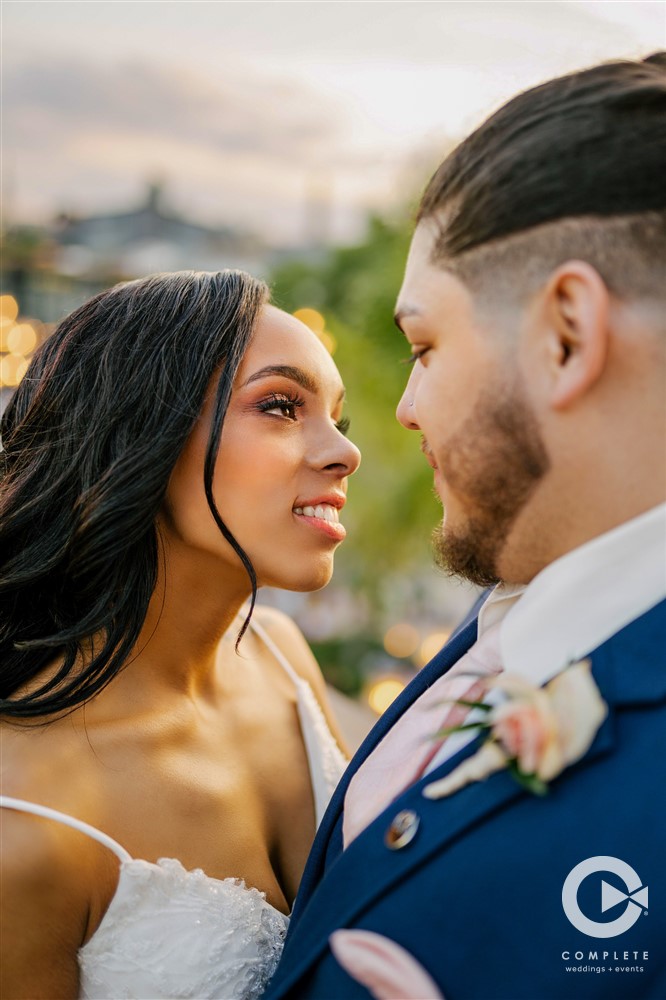 Bride looking at groom during a Disney Springs wedding in April