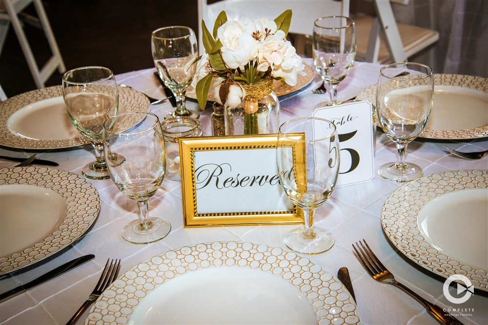 Wedding detail shot of a table with centerpiece in the middle