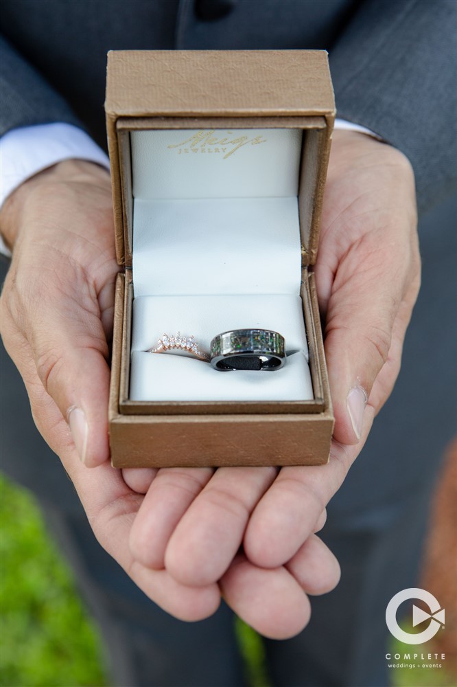Groom's ring being shown detail photo in Apopka Florida