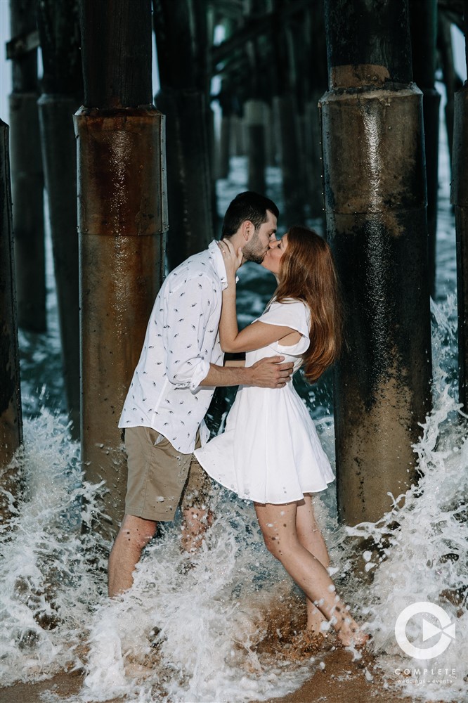 Engaged couple photos for save the dates on the beach