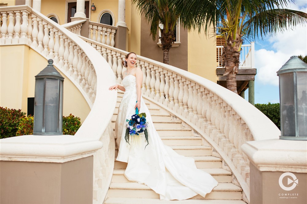 Bride walking down the stairs during her late November wedding in 2020