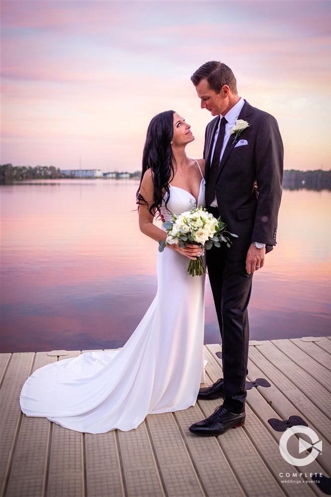 Bride and groom's wedding photo at Paradise Cove in Orlando, FL during Fall 2021 wedding