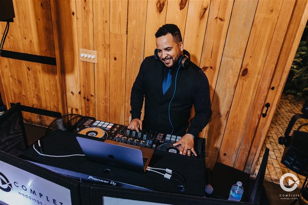 DJ Brandon mixing at a wedding in Orlando near Christmas