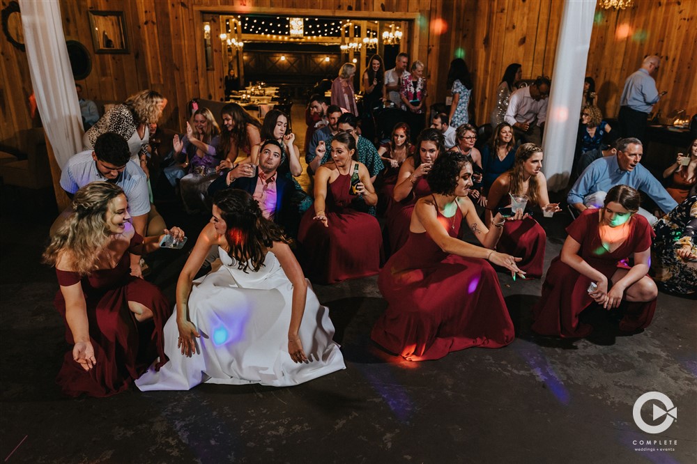 Wedding party dancing during Orlando wedding in December DJ Brandon performing