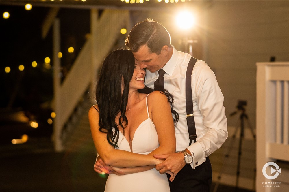 Beautiful shot of couple slow dancing at their Paradise Cove wedding reception