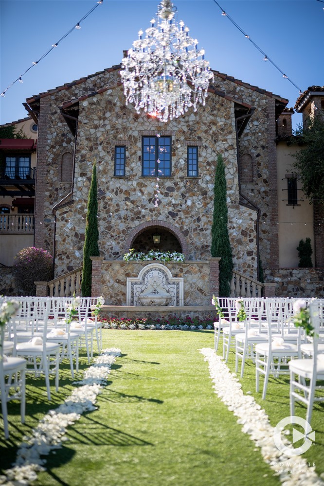 Wedding ceremony site at Bella Collina in West Orlando with chandelier over top