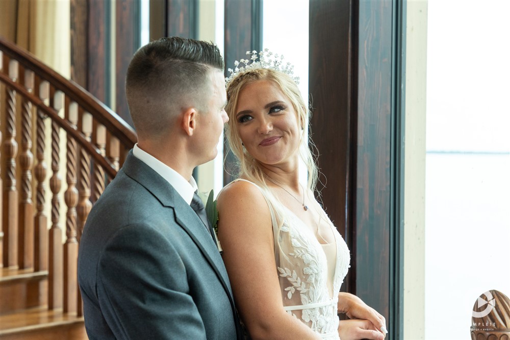 Bride looking at her husband with joy after wedding ceremony beautiful moment