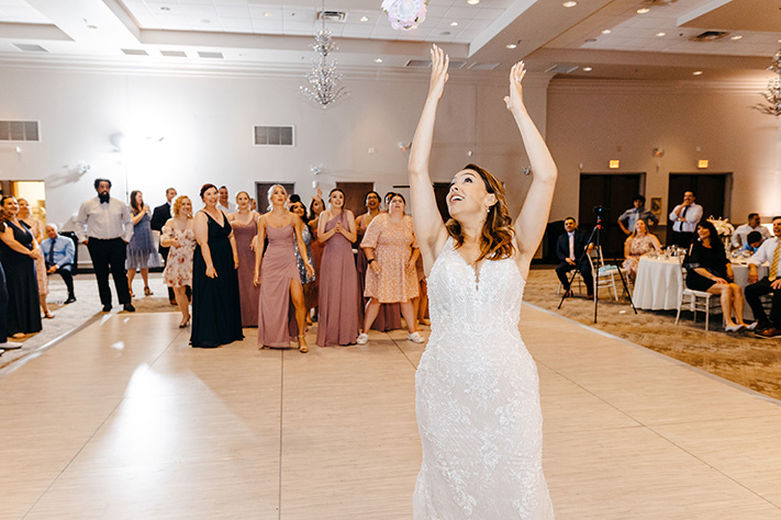 Bouquet toss at Holy Trinity Reception Center in Orlando, FL