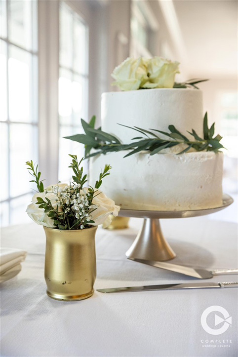 Gold accents for decoration at Tuscawilla Country Club wedding reception in Orlando, FL