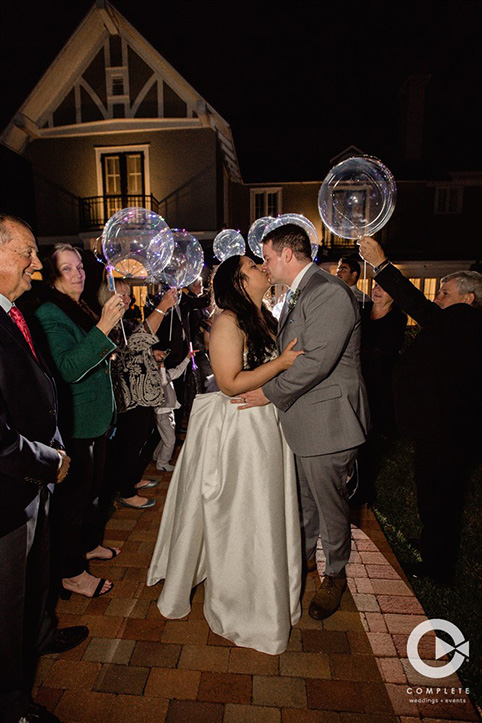 Guests hold balloons during send-off in Orlando, FL at The Capen House