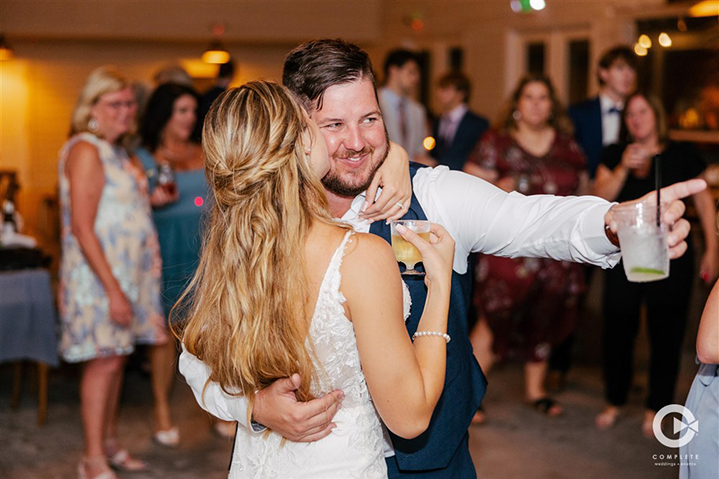 Bride and groom dancing together during open dance in New Smyrna, FL