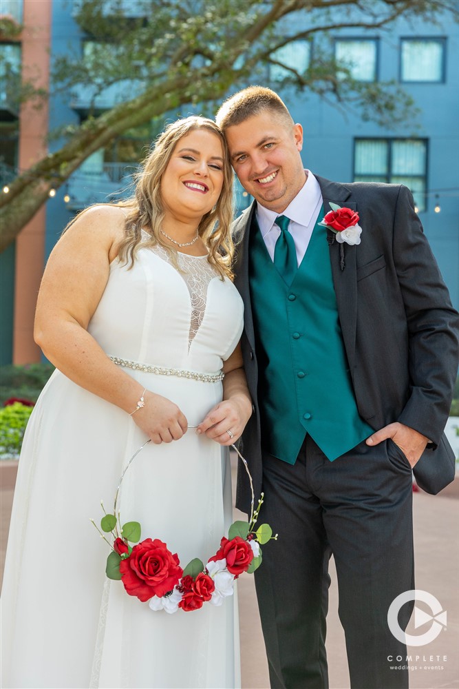 Bride and groom celebrate their wedding at Disney World in Kissimmee Florida beautiful day for a wedding