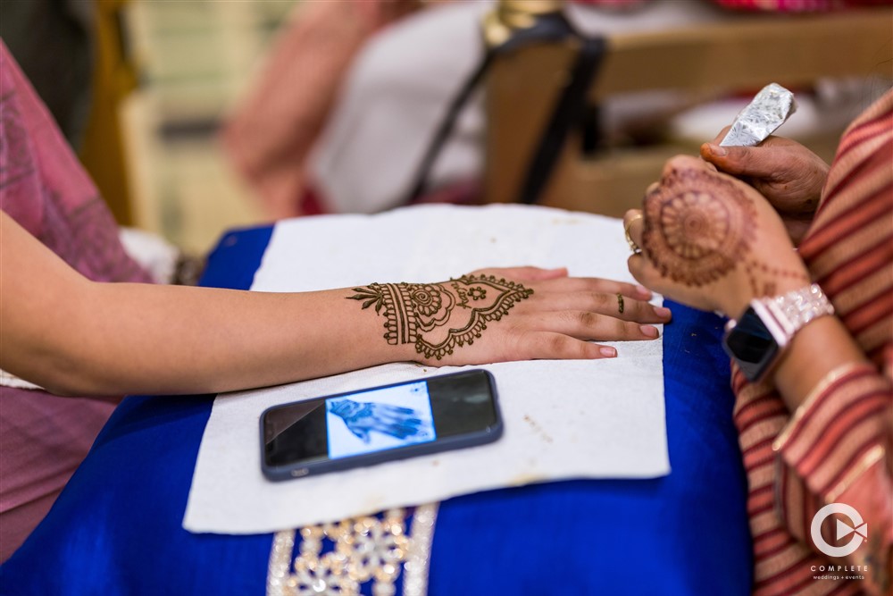 henna tattoos at wedding reception