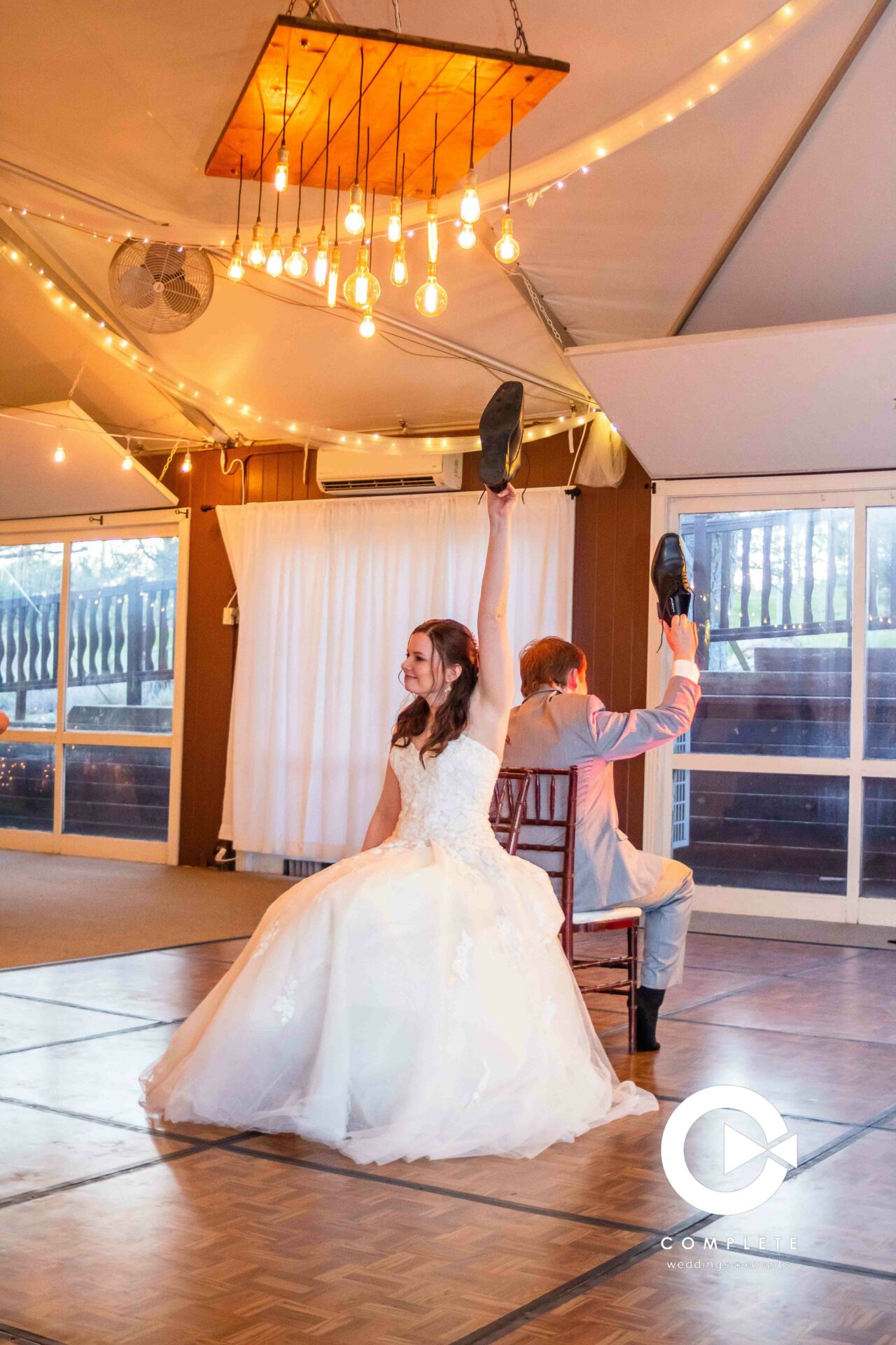 Professional wedding photographer near Rapid City - playing a game during the reception