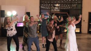 Professional DJ leading the group dance