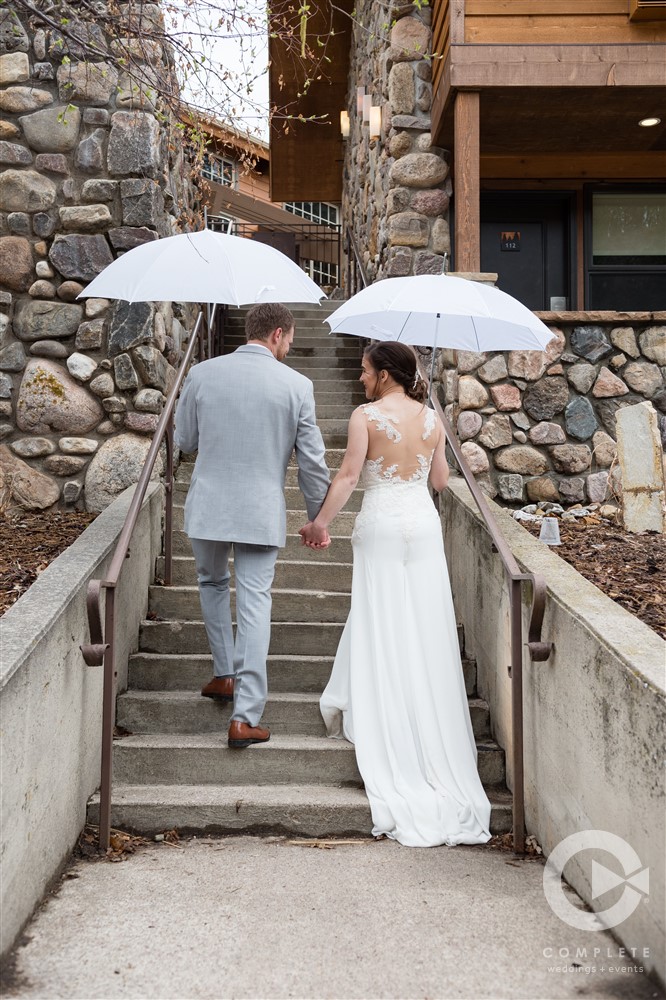 Rainy May day with umbrellas | Custer State Park Wedding