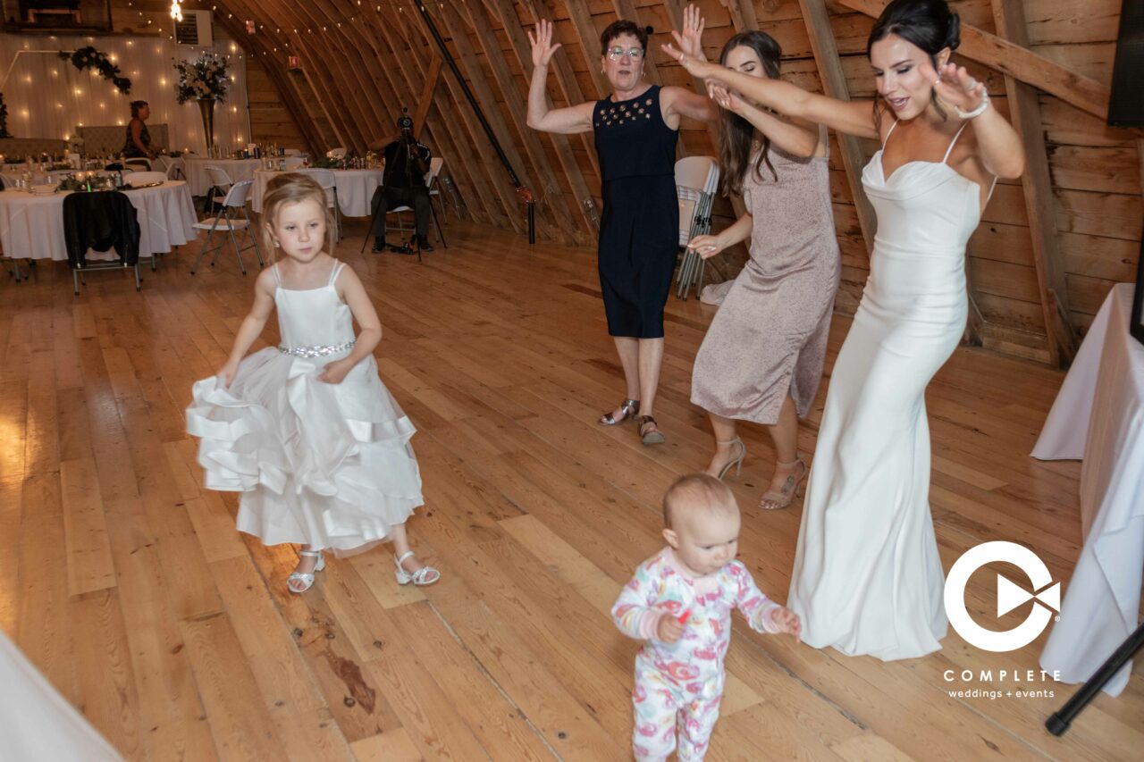 bride dancing with kids