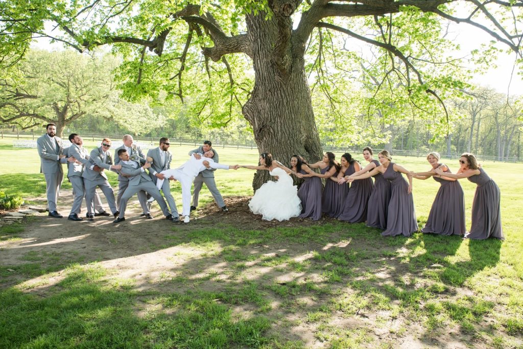 Having Fun Bridal Party Photo at Mayowood Stone Barn in Rochester, MN