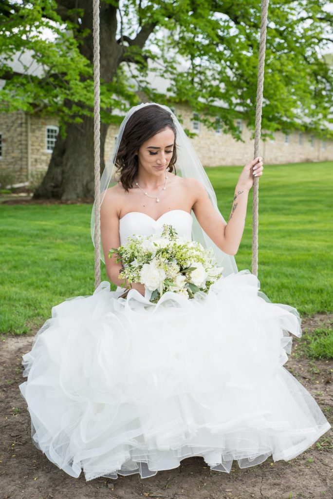 Bride Portrait on the Swing at the Mayowood Stone Barn in Rochester, MN