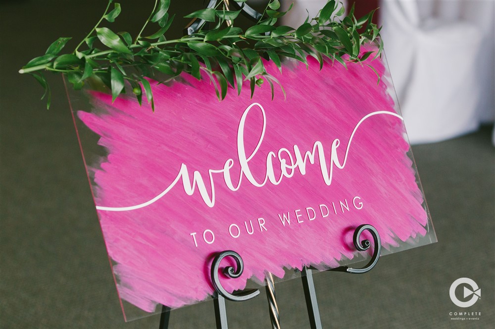 welcome wedding sign in bright fuschia