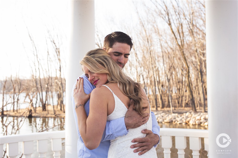 Man hugging his fiance during an intimate engagement shoot