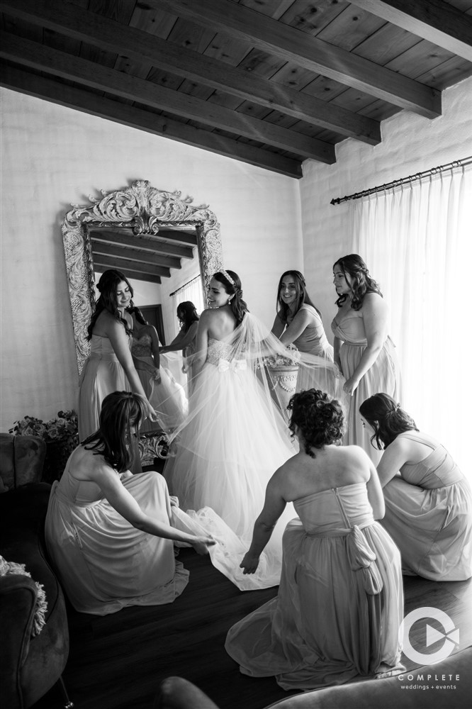 bridesmaids and bride getting ready