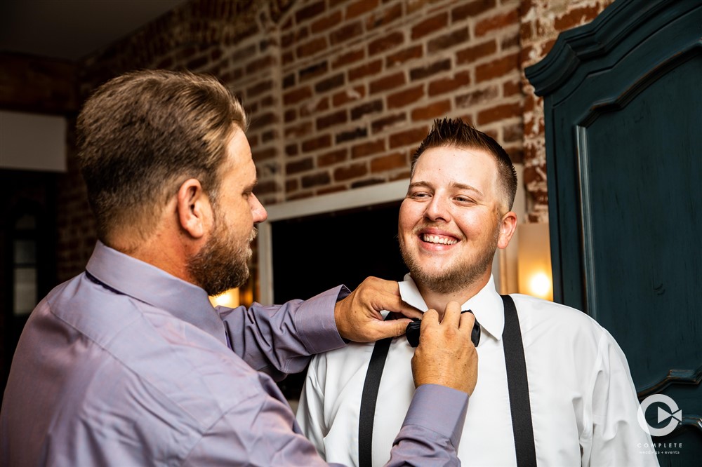 groom and groomsmen getting ready