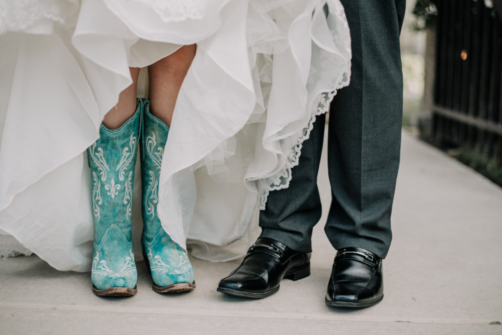 teal cow girl boots on bride