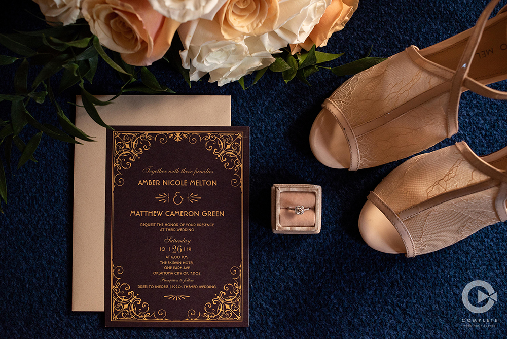 Wedding invite with wedding shoes and bouquet