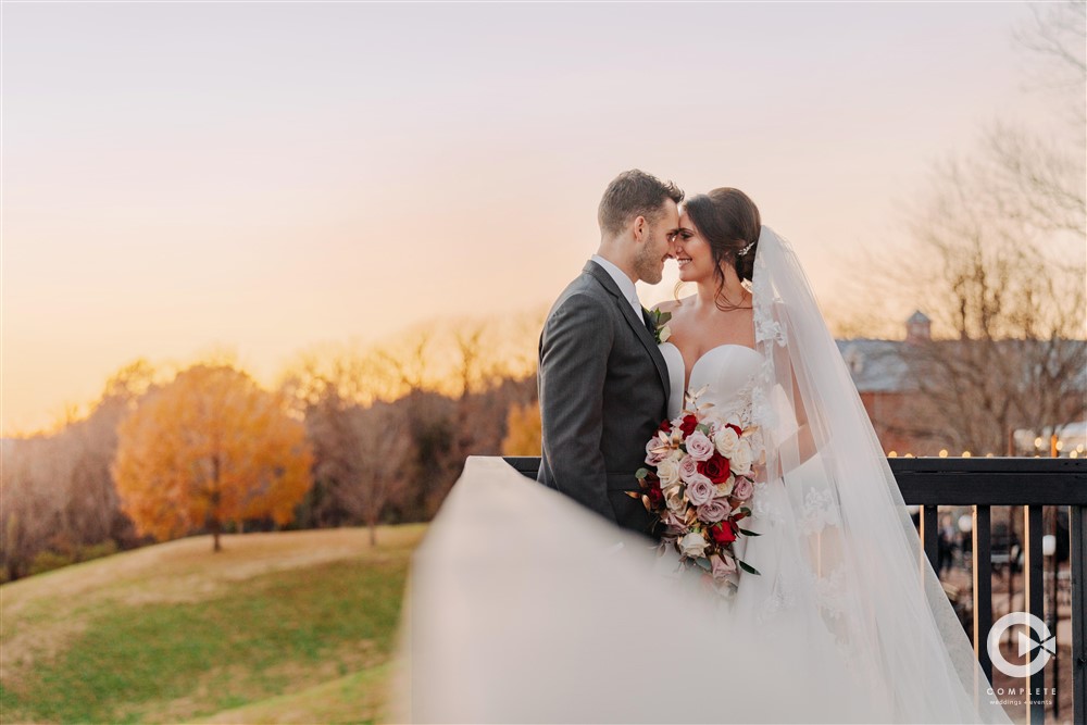 Happy bride and groom in autumn
