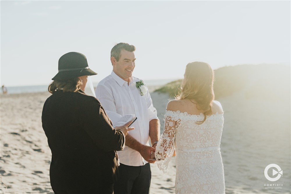 Ceremony on the beach with officiant