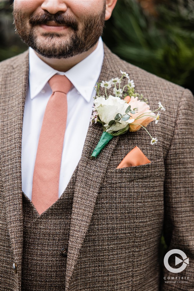 peach groom attire