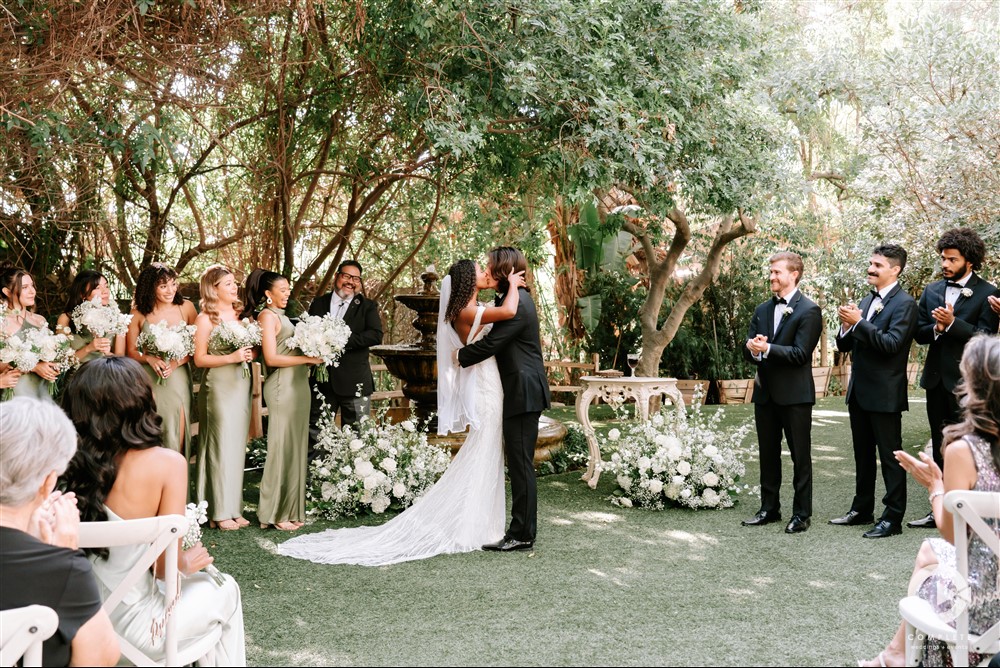 bride and groom kiss