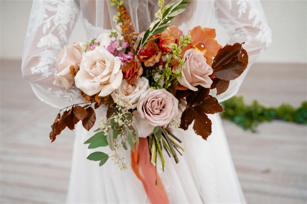 orane & brown wedding flowers