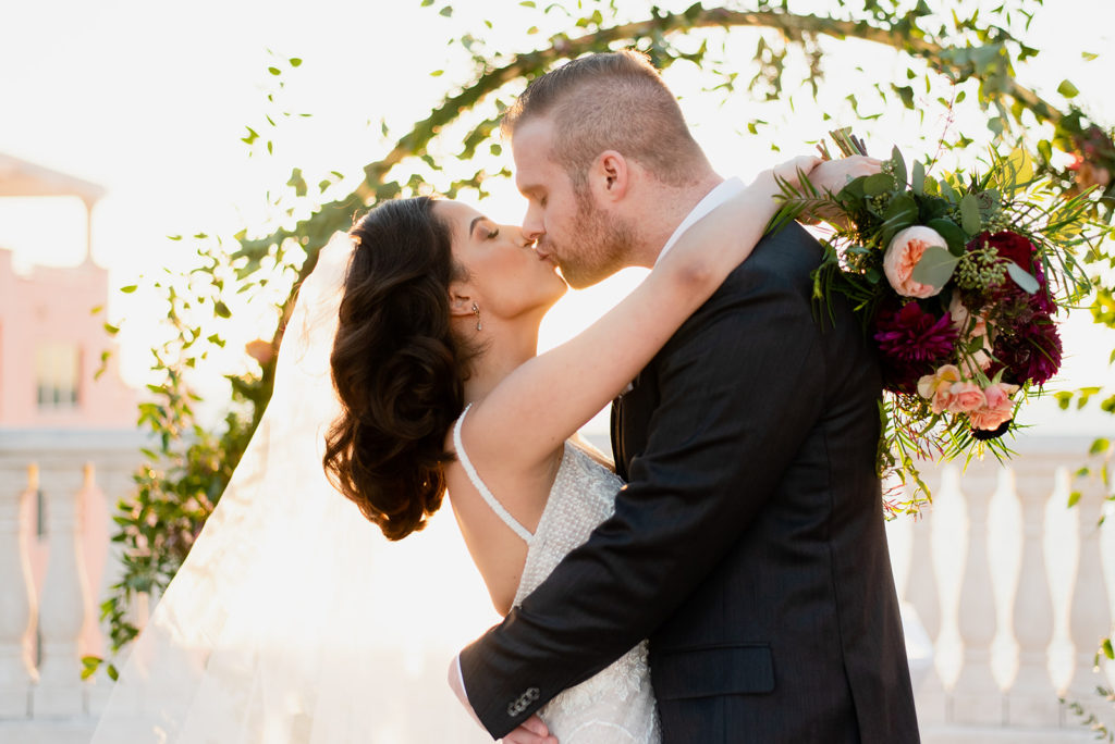 Wedding Budget Tips & Tricks, Wedding Photographer Ruth Bride & Groom Ceremony Kiss
