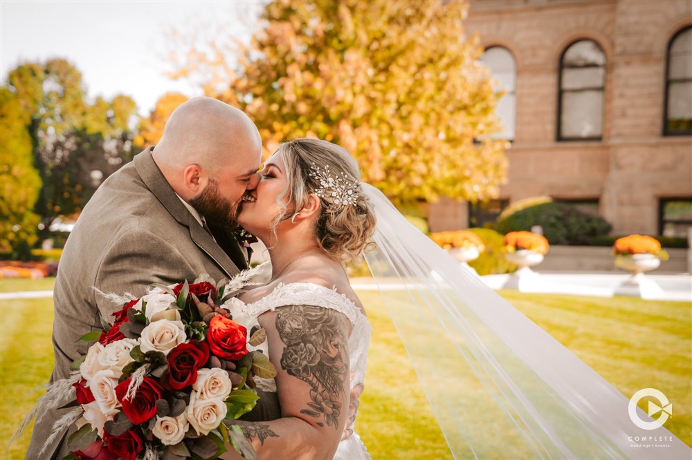 bride and groom kiss