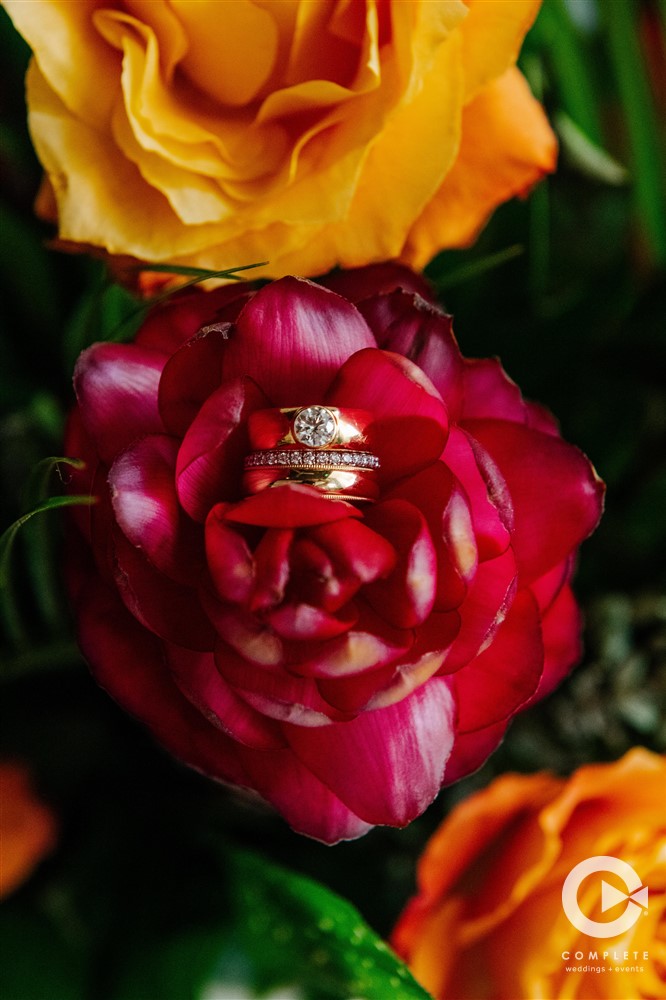ring placed in colorful flowers