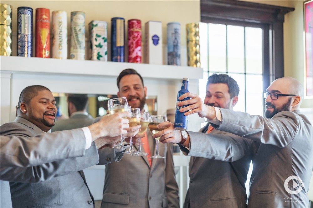 Groomsmen toast at Palmetto, Florida wedding venue.