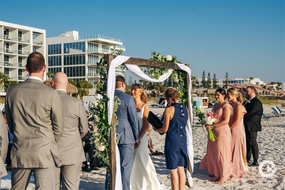 Beach wedding ceremony photos on Florida's coastline.