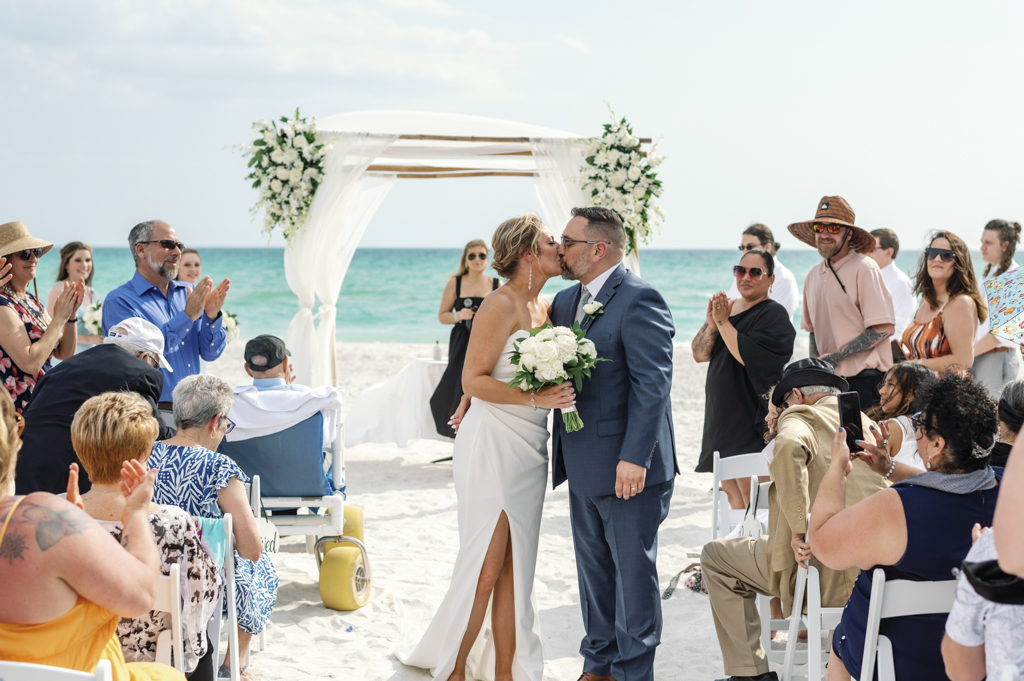 Jennifer and Jose’s wedding at The Resort at Longboat Key Club, Sarasota Beachfront Resort - The Couple Share a Kiss