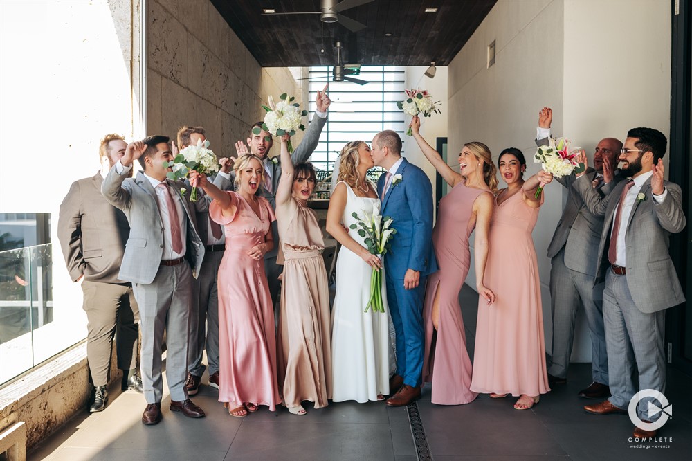 The Entire Bridal Party pose at Zota Beach Resort